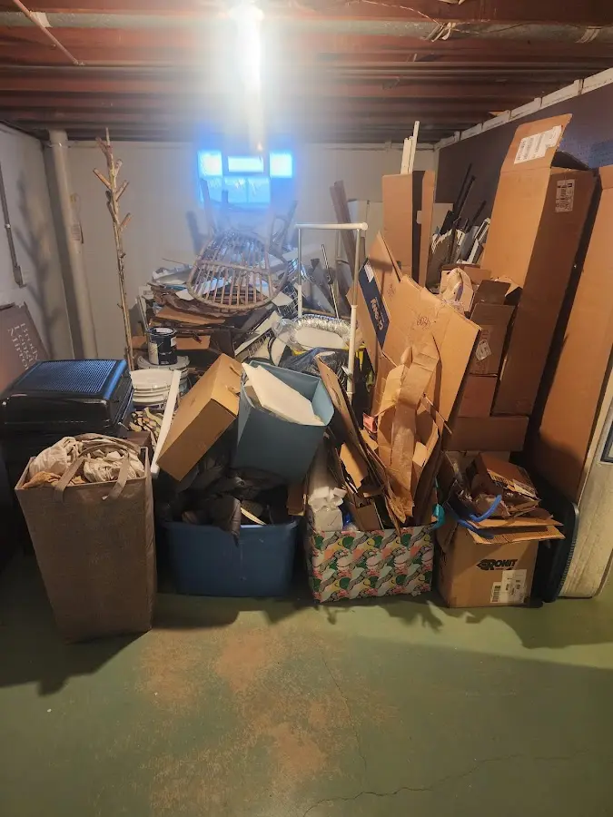 Roll-off dumpster container at job site for Construction Dumpster Rental in Plymouth